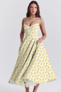 Close-up of a double-layered floral princess dress with waist-cinching and a mesh hemline