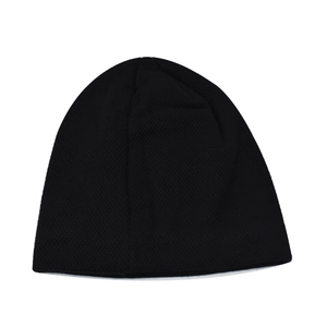Detail of a black fleece-lined knit winter hat with a minimalist plaid pattern