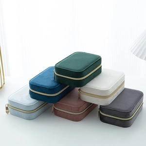 Portable velvet jewelry organizers with gold zippers in six elegant assorted colors
