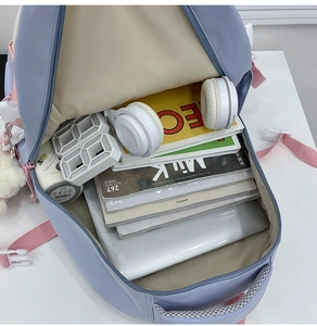 High-capacity blue and pink student backpack showing spacious interior compartment and storage