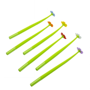 Detailed close-up of six creative silicone pens with colorful daisy flower toppers