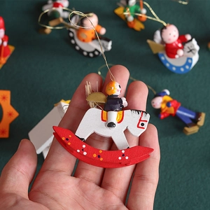 Detail of hand-painted wooden Christmas ornament featuring a soldier on a white horse