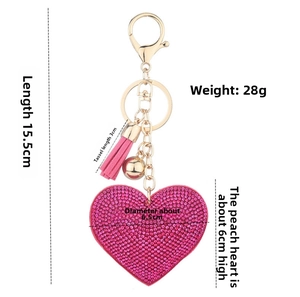 Size chart of pink rhinestone heart keychain with dimensions 15.5cm and 28g weight