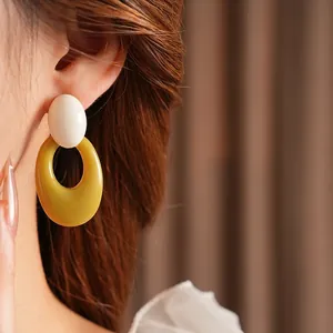 Retro oval hollow earrings with white studs and olive green resin hoops for women