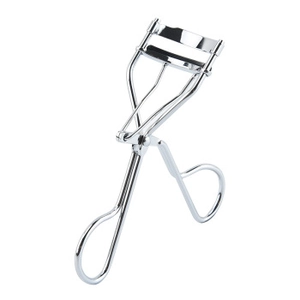 Close-up of a professional silver metal eyelash curler with ergonomic spring design