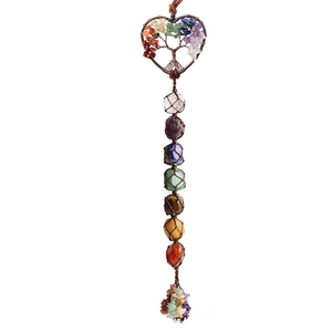 Detail of heart-shaped Tree of Life pendant with seven chakra stones and tassel