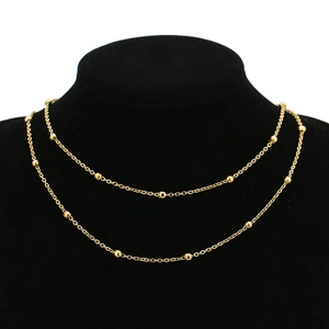 Detail of 4mm 18k gold-plated stainless steel bead chain on black neck display