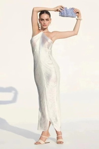Detail of white sequin fringe fabric on a stylish halter neck maxi dress with shimmer