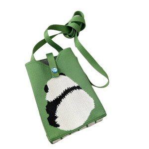 Mini green knit phone bag with panda pattern and blue button closure for daily use