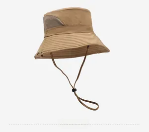Close-up of khaki sun hat with breathable mesh stitching and adjustable chin strap