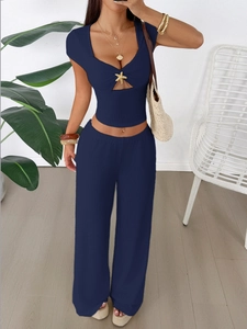 Women's dark blue ribbed knit two-piece set with short sleeve crop top and wide leg pants