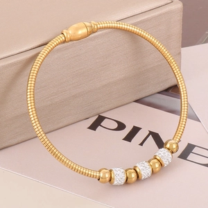 Detail of 18K gold plated snake chain bracelet with sparkling crystal pave beads