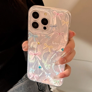 Detail of dopamine color bows and rhinestones on a Lucky iPhone 16 Pro Max IMD case