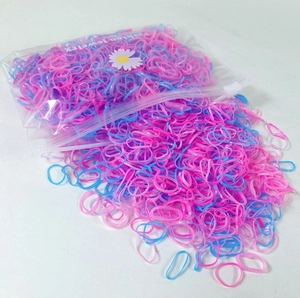 Mix of pink and blue disposable elastic hair bands for girls in a clear zipper pouch