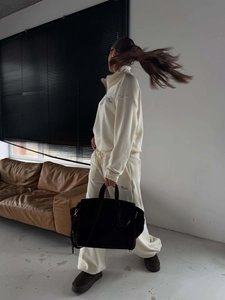 Beige fleece two-piece sportswear set with quarter-zip sweatshirt and wide-leg joggers