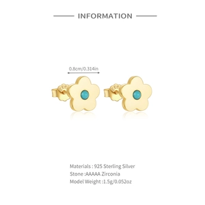 Close-up of S925 sterling silver flower earrings with blue zircon and size dimension 0.8cm