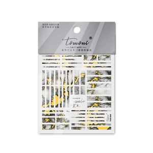 Macro detail of TOG-005 nail art stickers featuring marble texture and gold foil accents