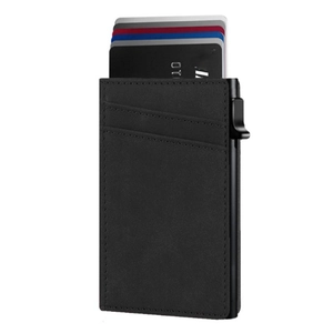 Detail view of carbon fiber metal wallet showing automatic pop-up card mechanism and slots