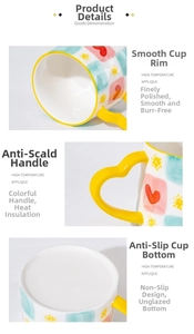 Detail view of heart-shaped handle and anti-slip bottom on ceramic mug with rainbow art