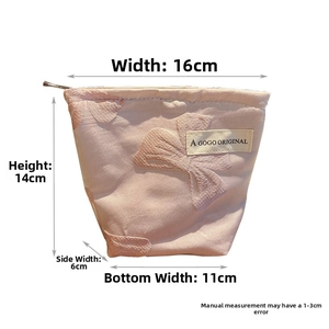 Pink canvas makeup bag with bow jacquard pattern and detailed size measurements