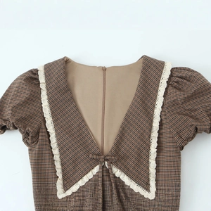 Vintage brown plaid dress with lace collar, bow detail and puff sleeves for women