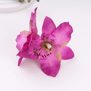 Macro detail of artificial silk magenta orchid petals with realistic brown spotted texture