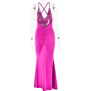 Detailed back view of magenta backless dress with cross straps and ruched mermaid hem