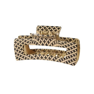 Close-up of a 10.5cm large leopard print hair claw clip with geometric pattern and sturdy spring
