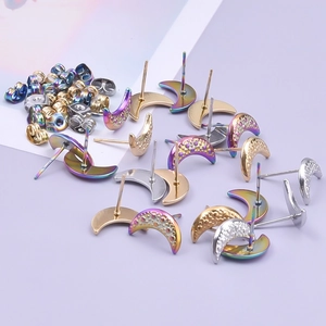 Detailed view of crescent moon stud earrings in iridescent, gold, and silver finishes