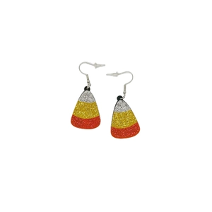 Glitter acrylic candy corn earrings with festive white yellow and orange layers