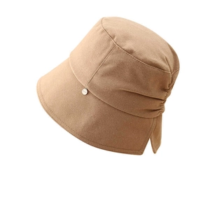 Elegant khaki cotton bucket hat with a metal logo tag and stylish sun protection design