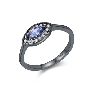 Vintage S925 sterling silver ring featuring a marquise blue gemstone and halo stones