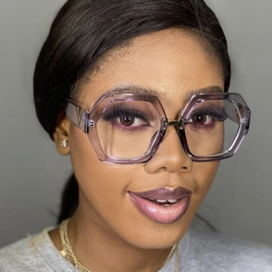 Fashionable oversized polygonal glasses with light purple frames on female model