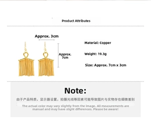 Technical drawing of gold tassel earrings with size dimensions and copper material specs