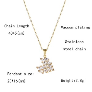 Detail view of gold stainless steel necklace showing chain length and pendant size