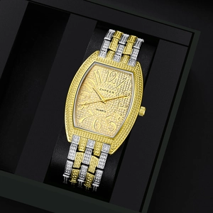 Luxury gold and silver quartz watch with diamond-encrusted tonneau case and numerals