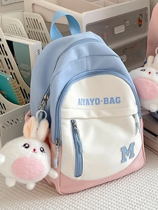 Pastel blue and pink oxford student backpack with cute white bunny plush keychain