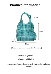 Detailed view showing large plaid tote bag dimensions 40x35x8cm with handles and pockets