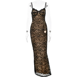 Detailed look at black lace dress with golden chain belt on invisible mannequin