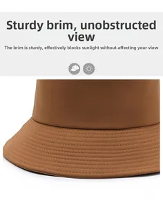 Macro shot of stiff brim on caramel cotton bucket hat with durable multi-row stitching