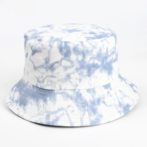 Close-up of blue and white tie-dye bucket hat showing high-density twill fabric texture