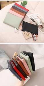 Flat lay of colorful lychee texture PU leather slim pouches with silver zippers
