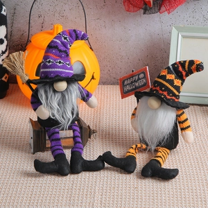 Halloween gnomes with striped hats and brooms on a festive pumpkin background