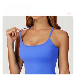 Detail of royal blue sports tank top with thin straps and ribbed texture fabric