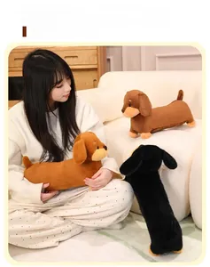 Detailed close-up of three colorful dachshund plush toys with soft texture in home setting