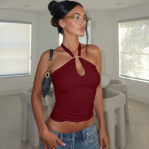 Detail of burgundy halter top featuring gold metal ring buckle and cutout design