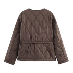 Detail of dark brown quilted jacket featuring elegant onion patterns and elastic waist design
