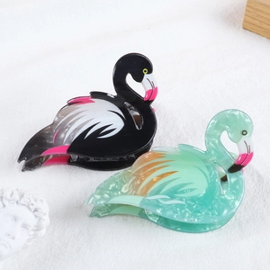 Cute acrylic flamingo hair claws in black, white, and mint green marble textures