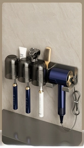 Gunmetal wall-mounted bathroom organizer featuring hair dryer holder and three cups