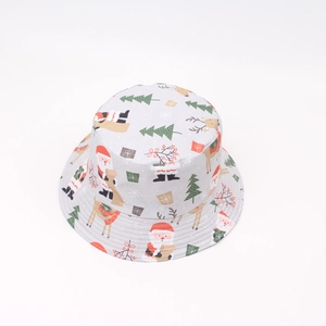 Detail of Christmas bucket hat with festive reindeer and Santa Claus pattern print